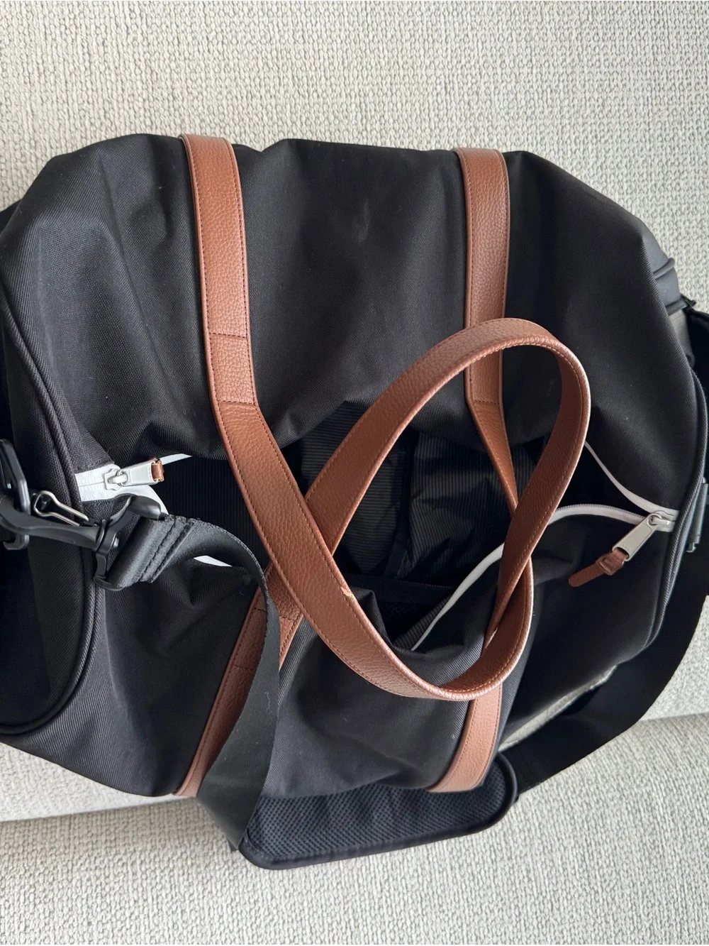 Classic Black Duffel Bag with Brown Handles